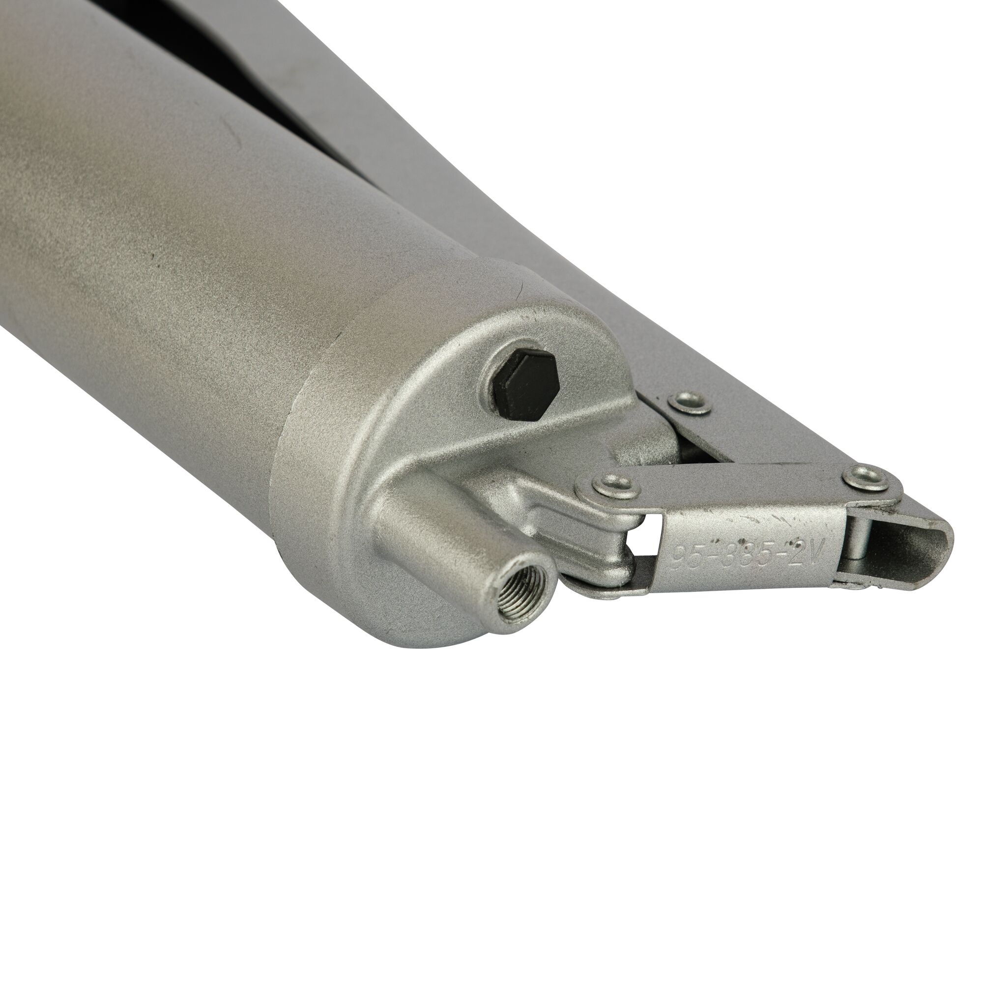 Stanley 95-385-2V grease gun close-up showing metal nozzle and hex bolt, photography on white background.