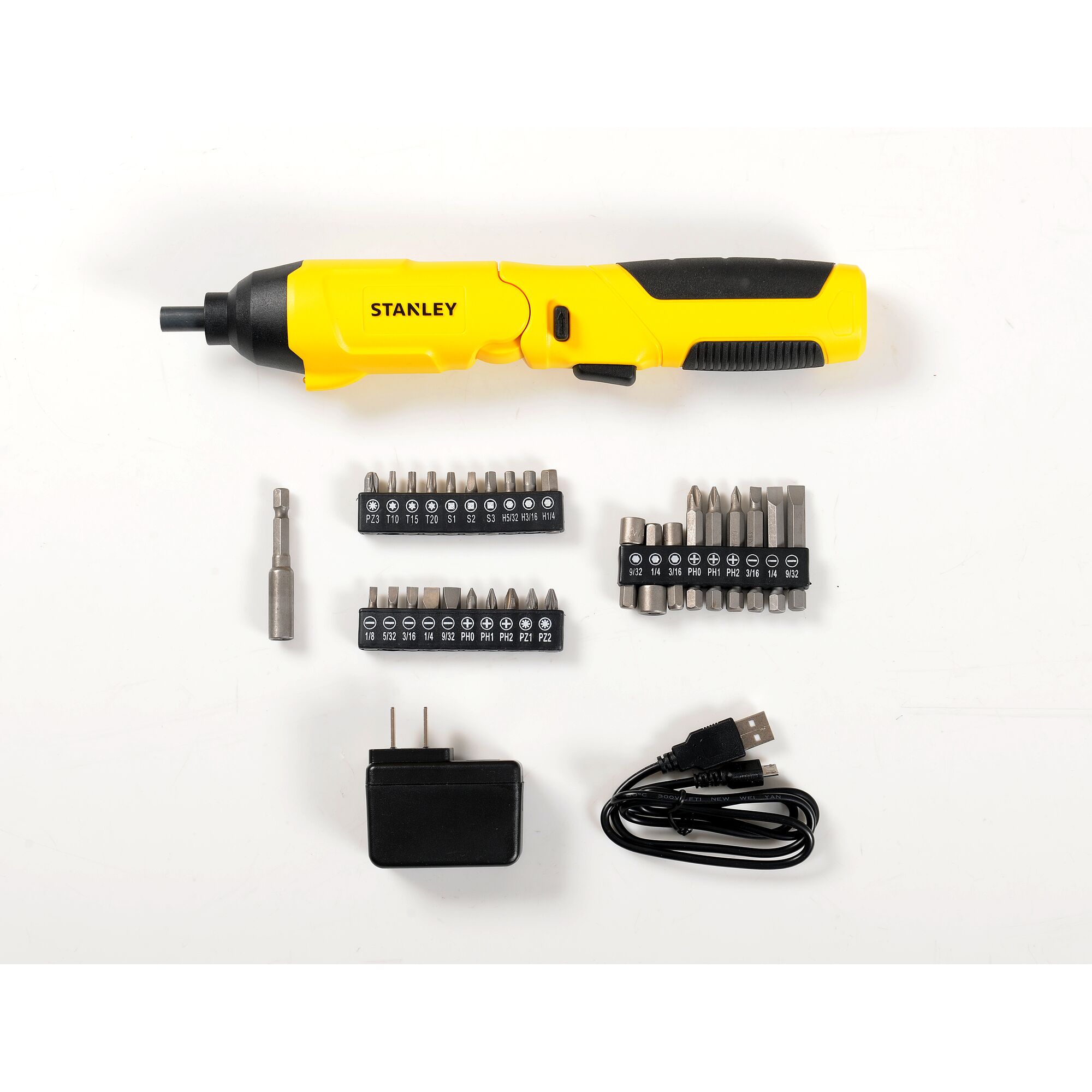 STANLEY SCS4K electric screwdriver kit with yellow handle, bit sets, charger, and USB cable, top view.