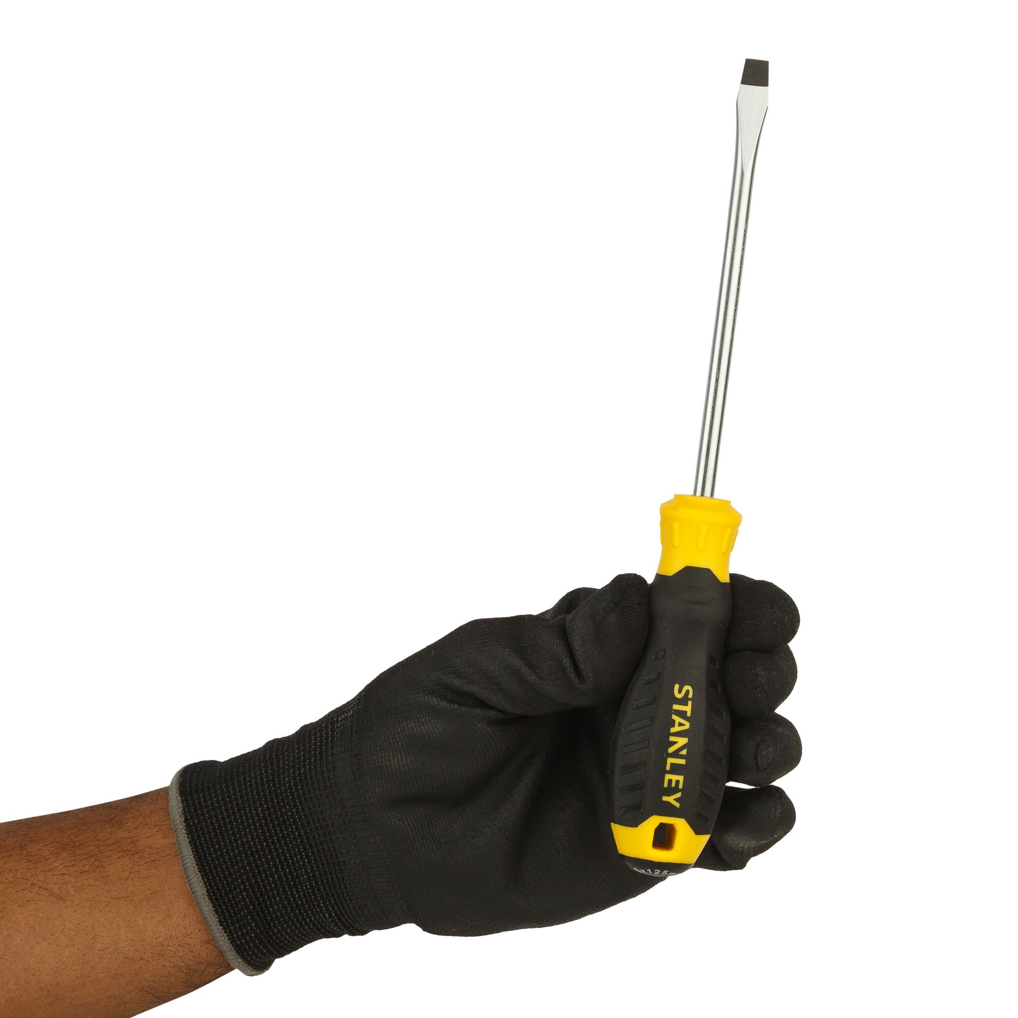 STANLEY STMT60827-8 flathead screwdriver with black and yellow handle held in a gloved hand, side angle.